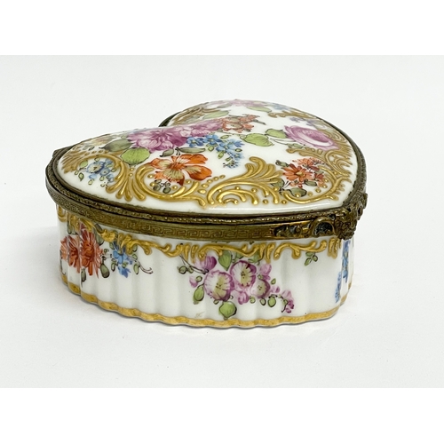 219J - A 19th century Meissen porcelain trinket box with hand painted flower and gilding decoration. 8x8x3.... 