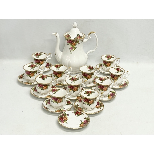 272E - A 24 piece Royal Albert ‘Old Country Roses’ coffee set. 11 coffee cups, 12 saucer and a coffee pot.