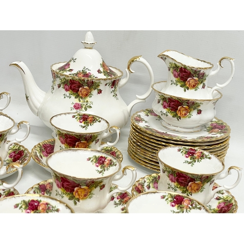 272F - A 39 piece Royal Albert ‘Old Country Roses’ tea set. Teapot 25x15x20cm. 12 sandwich plates, 12 tea c... 