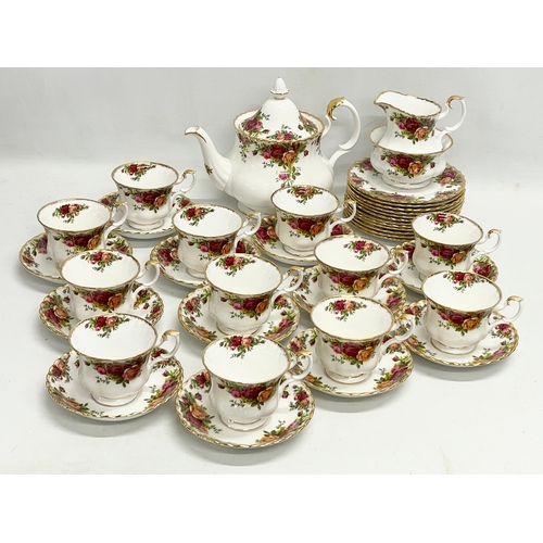 272F - A 39 piece Royal Albert ‘Old Country Roses’ tea set. Teapot 25x15x20cm. 12 sandwich plates, 12 tea c... 