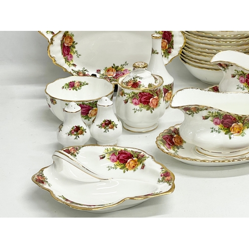 272G - 43 pieces of Royal Albert ‘Old Country Roses’ tea and dinner ware. A pair of gravy boats with saucer... 