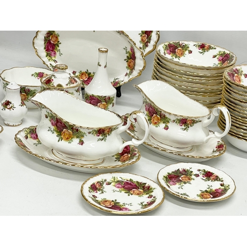 272G - 43 pieces of Royal Albert ‘Old Country Roses’ tea and dinner ware. A pair of gravy boats with saucer... 