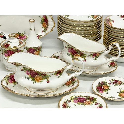 272G - 43 pieces of Royal Albert ‘Old Country Roses’ tea and dinner ware. A pair of gravy boats with saucer... 