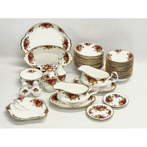 272G - 43 pieces of Royal Albert ‘Old Country Roses’ tea and dinner ware. A pair of gravy boats with saucer... 