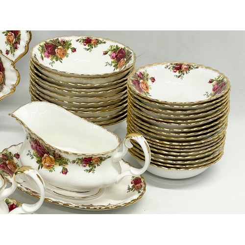 272G - 43 pieces of Royal Albert ‘Old Country Roses’ tea and dinner ware. A pair of gravy boats with saucer... 