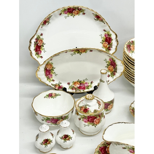 272G - 43 pieces of Royal Albert ‘Old Country Roses’ tea and dinner ware. A pair of gravy boats with saucer... 