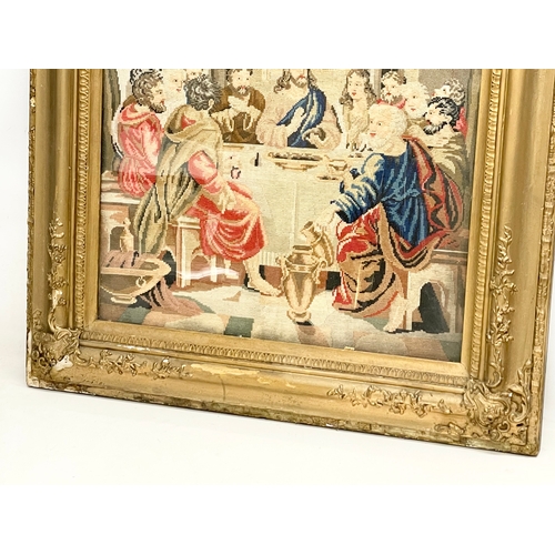 247G - A large 19th century gilt framed religious tapestry of Jesus and his 12 Disciples. 81x87cm