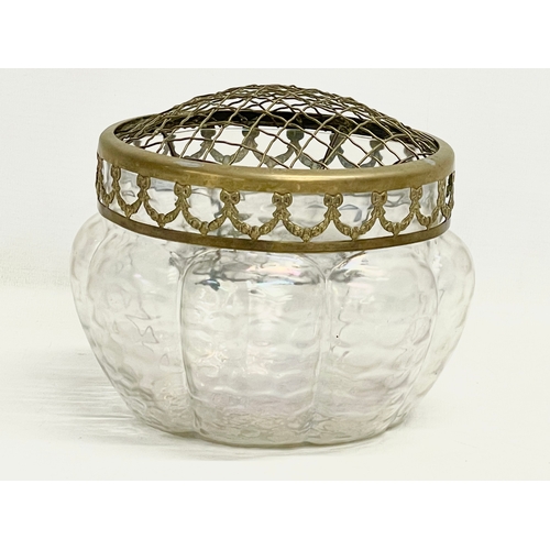 247I - A large late 19th century iridescent glass flower bowl with ornate brass top. 1890-1900. 18x24cm