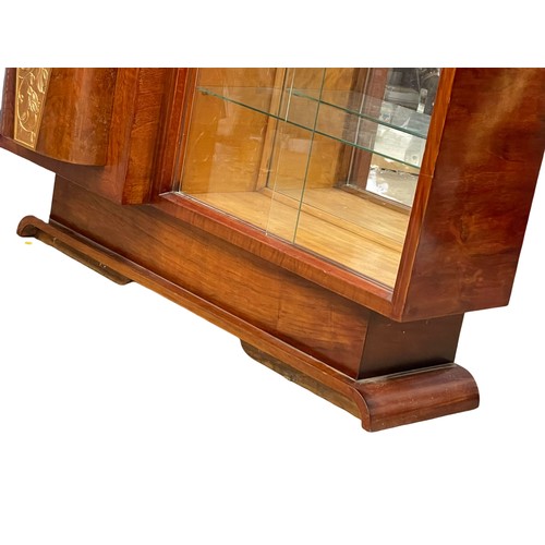 1001A - A good quality 1930’s Art Deco walnut cocktail display cabinet. 129x53x102cm.