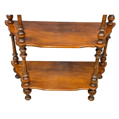 1132 - A a Victorian walnut 4 tier whatnot. 78x31.5x115.5cm