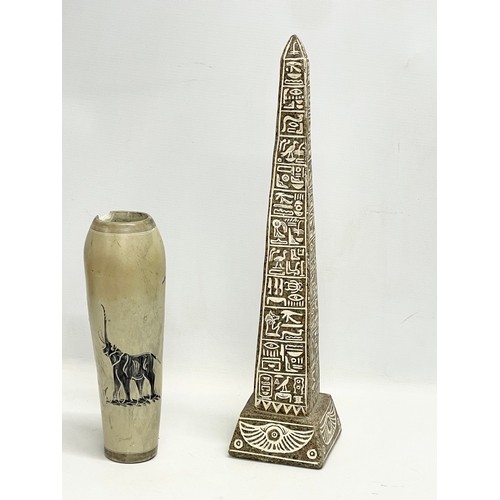 127K - A sundry lot. A large Egyptian marble Obelisk 44.5cm, 2 Chinese Terracotta soldiers and an African S... 