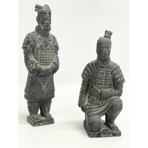 127K - A sundry lot. A large Egyptian marble Obelisk 44.5cm, 2 Chinese Terracotta soldiers and an African S... 