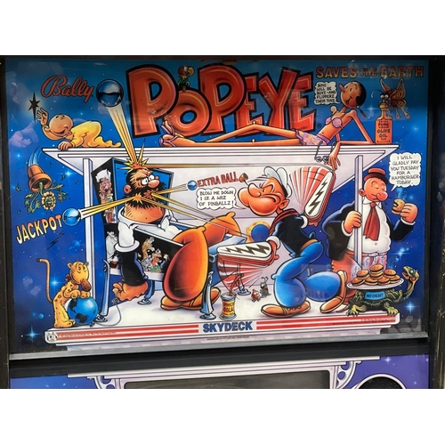 60 - A large vintage Popeye Saves The Earth arcade game. 64x132x134cm