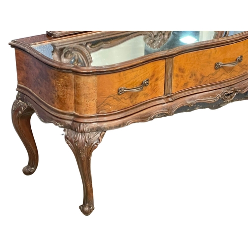 874 - An early 20th century French rococo style dressing table with 3 drawers on cabriole legs. 123x39x167... 