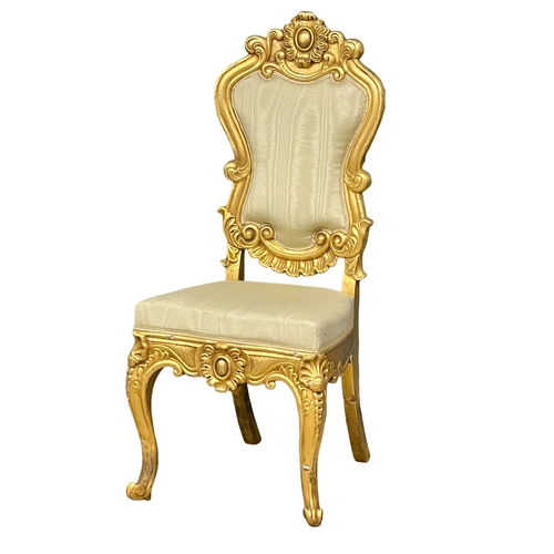 876 - A large late 19th century French heavy gilt hall chair. Circa 1890-1900.