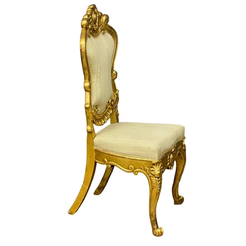 876 - A large late 19th century French heavy gilt hall chair. Circa 1890-1900.