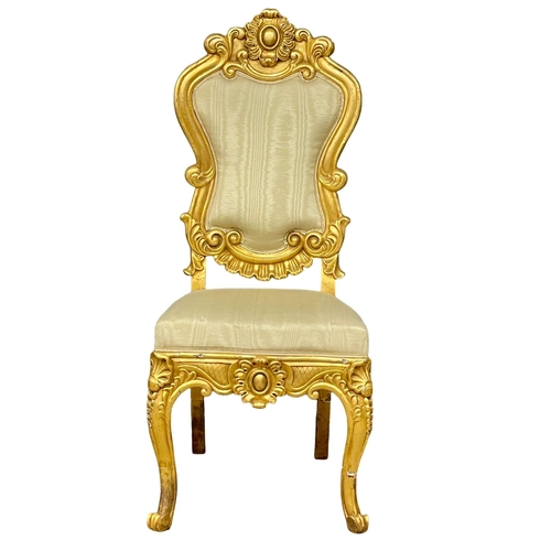 876 - A large late 19th century French heavy gilt hall chair. Circa 1890-1900.