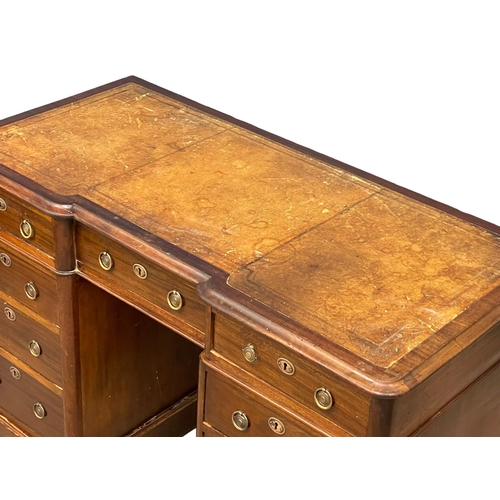 877 - A Victorian mahogany pedestal desk with leather top. 122x58x77cm