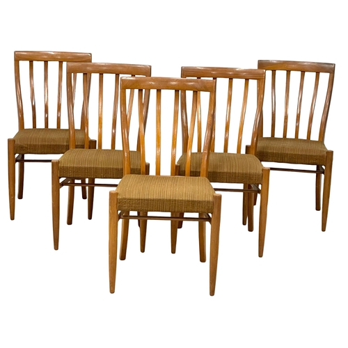 878 - A set of 5 Mid Century ladder back dining chairs.