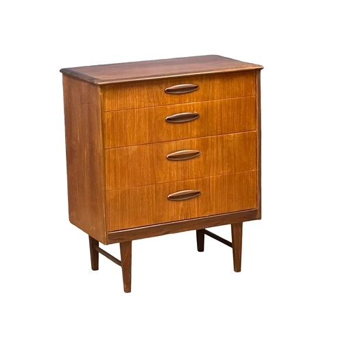 883 - A Mid Century teak chest of drawers by Homeworthy. 77x42x91.5cm