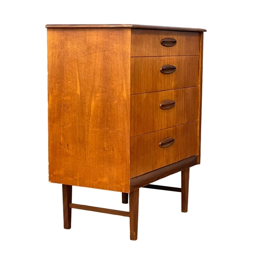 883 - A Mid Century teak chest of drawers by Homeworthy. 77x42x91.5cm