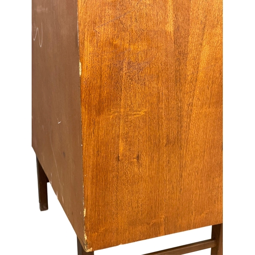 883 - A Mid Century teak chest of drawers by Homeworthy. 77x42x91.5cm