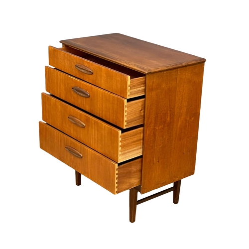 883 - A Mid Century teak chest of drawers by Homeworthy. 77x42x91.5cm