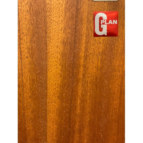 888 - A G-Plan Fresco Mid Century teak double door wardrobe. 91x58.5x176cm