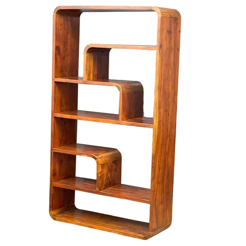 891 - A large Mid Century Modern room divider shelving unit. 100x35x180.5cm