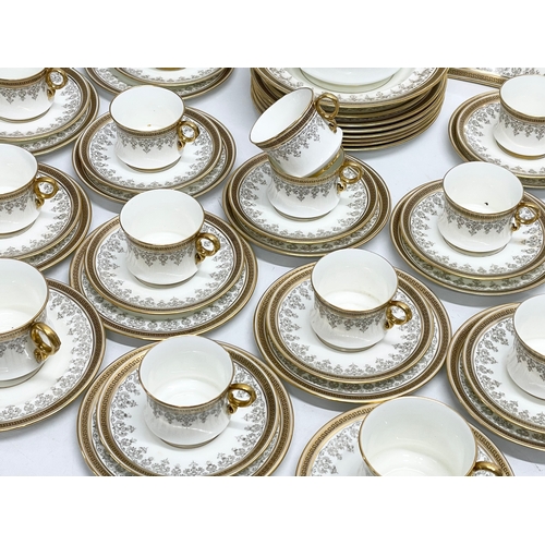 127L - A good quality 72 piece early 20th century Cauldon LTD gilt porcelain tea service.