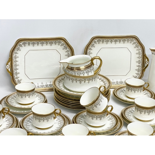 127L - A good quality 72 piece early 20th century Cauldon LTD gilt porcelain tea service.