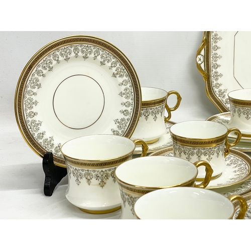 127L - A good quality 72 piece early 20th century Cauldon LTD gilt porcelain tea service.