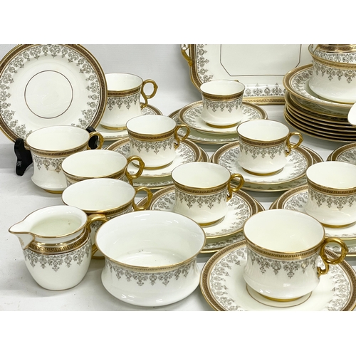 127L - A good quality 72 piece early 20th century Cauldon LTD gilt porcelain tea service.