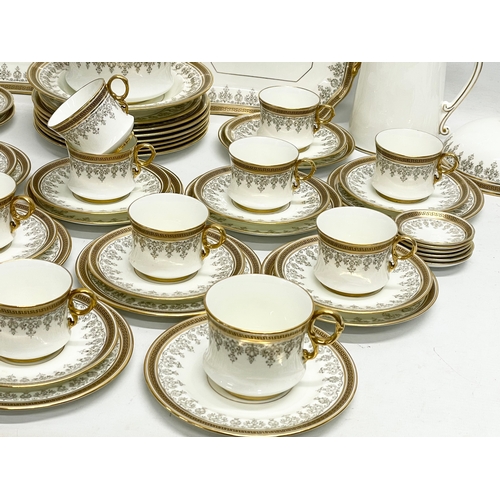 127L - A good quality 72 piece early 20th century Cauldon LTD gilt porcelain tea service.