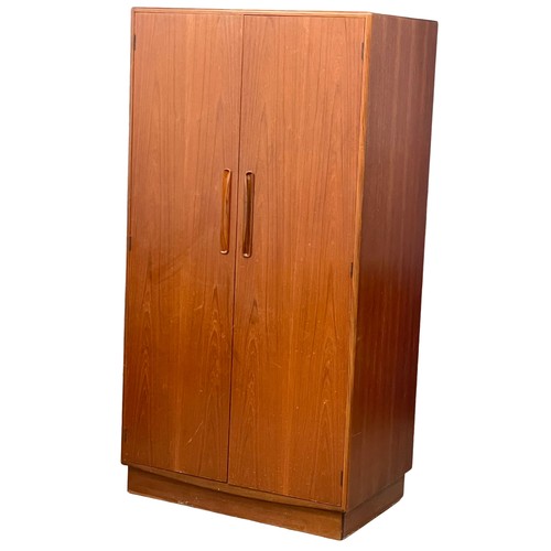 888 - A G-Plan Fresco Mid Century teak double door wardrobe. 91x58.5x176cm