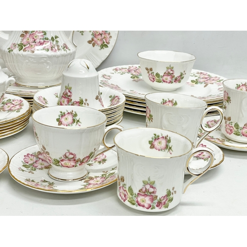 726 - A 48 piece Royal Grafton ‘Wild Rose’ Jacobean coffee and dinner service. 10 dinner plates, platter, ... 