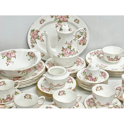 726 - A 48 piece Royal Grafton ‘Wild Rose’ Jacobean coffee and dinner service. 10 dinner plates, platter, ... 