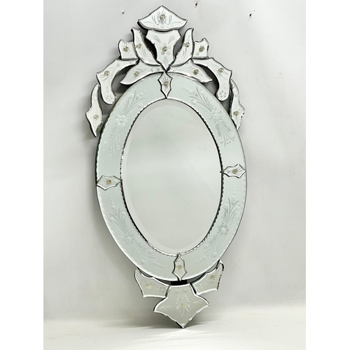 727 - A Venetian style mirror from Laura Ashley. 40x78cm