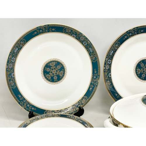 729 - A 30 piece Royal Doulton ‘Carlyle’ dinner set. 12 dinner plates, 2 tureens, 13 salad plates, a servi... 