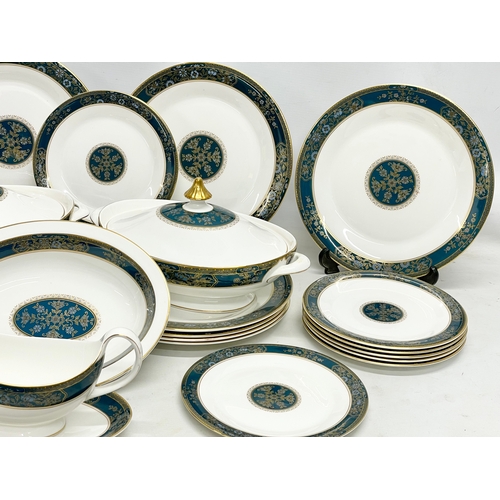 729 - A 30 piece Royal Doulton ‘Carlyle’ dinner set. 12 dinner plates, 2 tureens, 13 salad plates, a servi... 