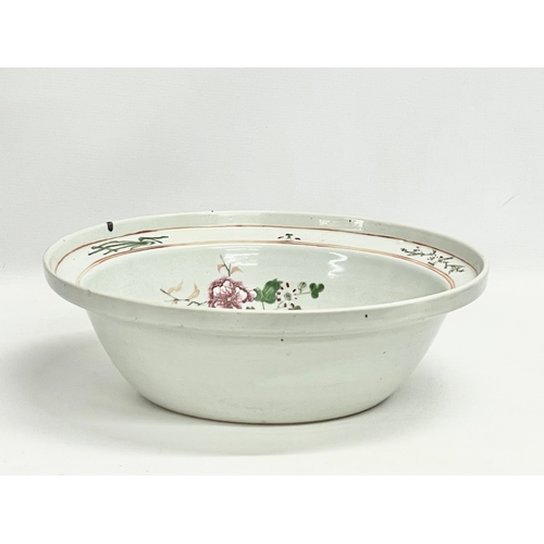 3 - An 18th century Chinese Qianlong Famille Rose washbowl. 1736-1799. 41x13cm