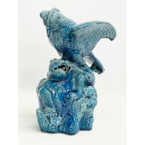 5 - A late 19th century Chinese Guangxu turquoise glazed bird of prey. 1875-1908. 15x19x27cm