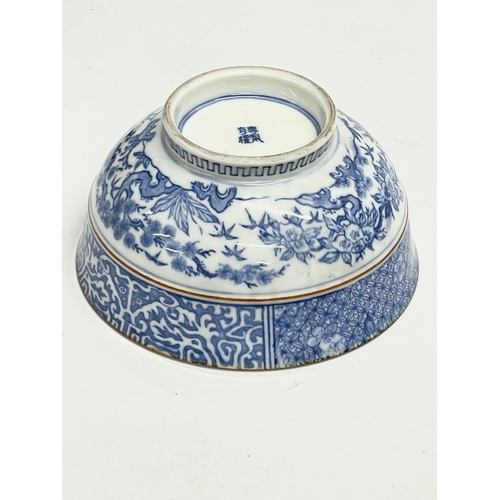 18 - An early 20th century Japanese blue and white porcelain bowl on stand. 15.5x8cm