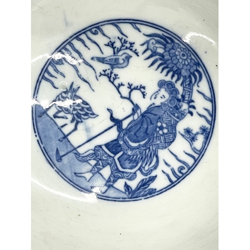 18 - An early 20th century Japanese blue and white porcelain bowl on stand. 15.5x8cm