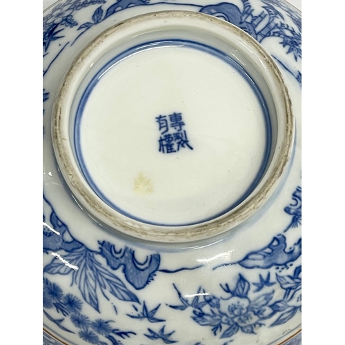 18 - An early 20th century Japanese blue and white porcelain bowl on stand. 15.5x8cm