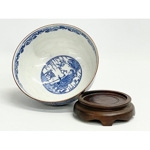 18 - An early 20th century Japanese blue and white porcelain bowl on stand. 15.5x8cm