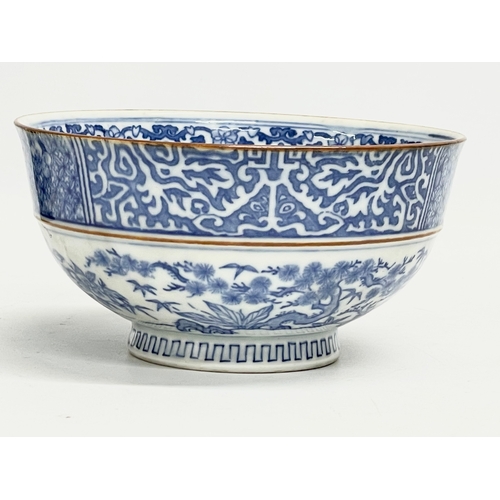 18 - An early 20th century Japanese blue and white porcelain bowl on stand. 15.5x8cm