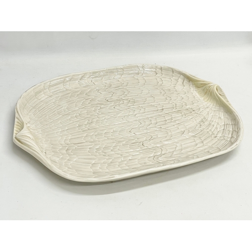 48 - A 3rd period Belleek Pottery ‘Tridacna’ tray. 1926-1946. 44x36cm