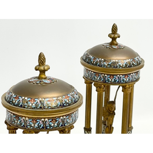 51 - A pair of late 19th century French brass dome garnitures with Egyptian revival figures, enamel decor... 