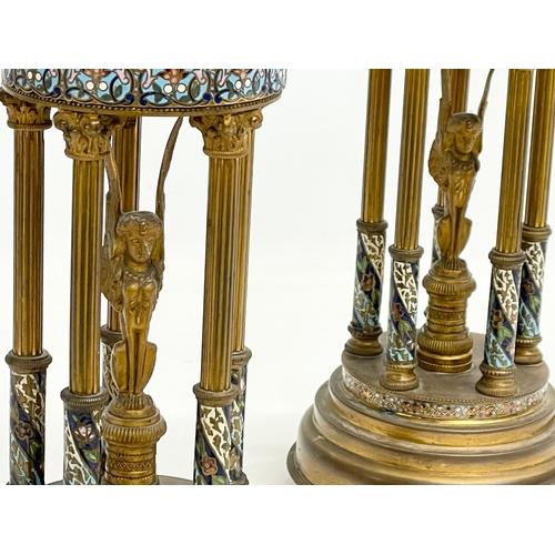 51 - A pair of late 19th century French brass dome garnitures with Egyptian revival figures, enamel decor... 